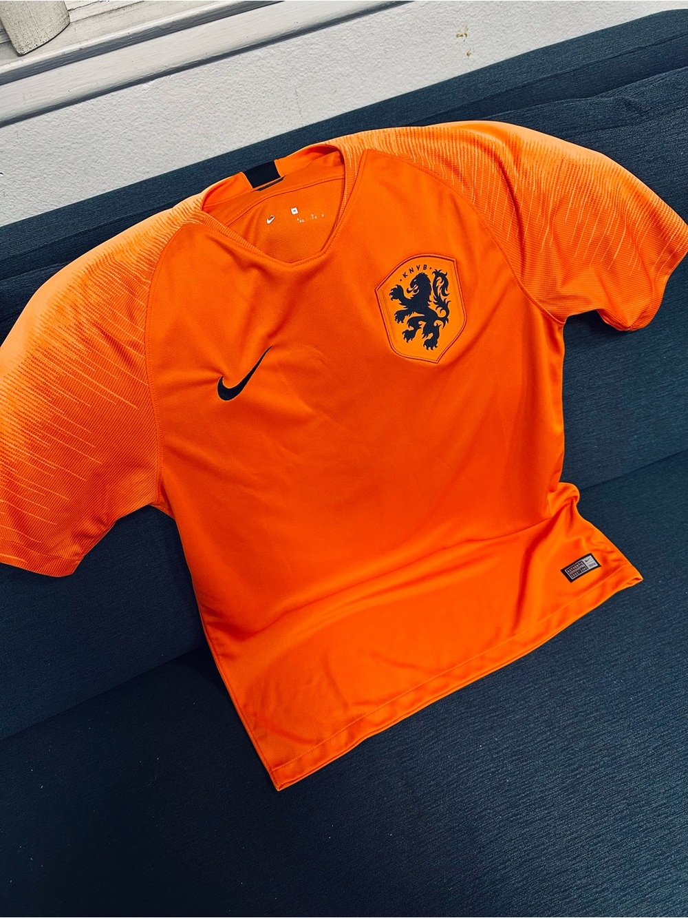 Authentic Nike Men's Bright Orange Football Drifit Jersey with Black Lion Crest